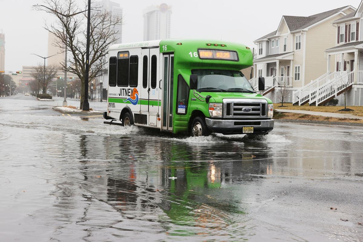 A+Jitney+drives+through+flooded+streets+during+major+coastal+flooding+Feb.+1.+Photo+courtesy+of+Climate+Central.