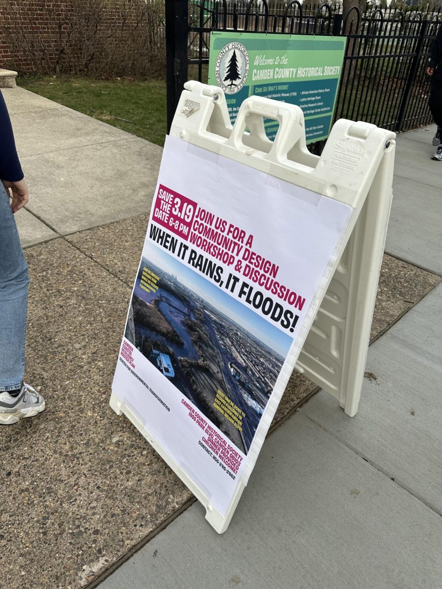 A sign sits outside of the Camden County Historical Society on the day of the community workshop on flooding in the city. (Jenalyz Serrata)
