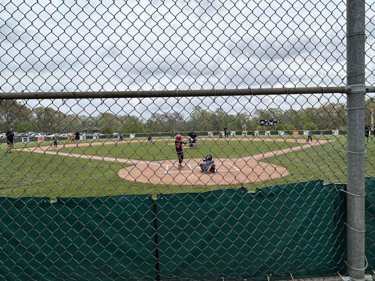 The first pitch of the opening game of the H4H tournament gets the event started. (Trevor Johnston)