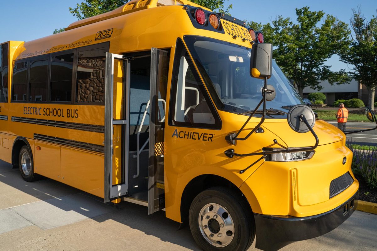 RIDE’s 30 passenger “Achiever” electric school bus on display at New Jersey Clean Cities Coalition’s "Electric School Bus Academy" event in June 2025.